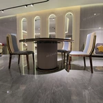 Statement Round Dining Table with Medusa Inlay, Beaded Edge, and Patterned Pedestal